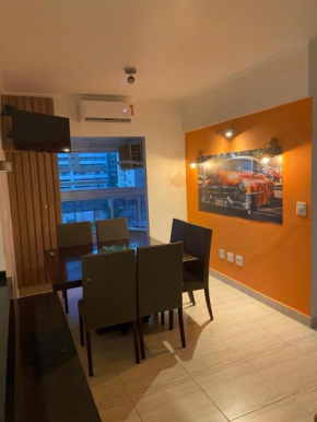 APARTAMENTO NA PRAIA GRANDE - Vila Caiçara - Piscina - Ar condicionado - Próximo à praia